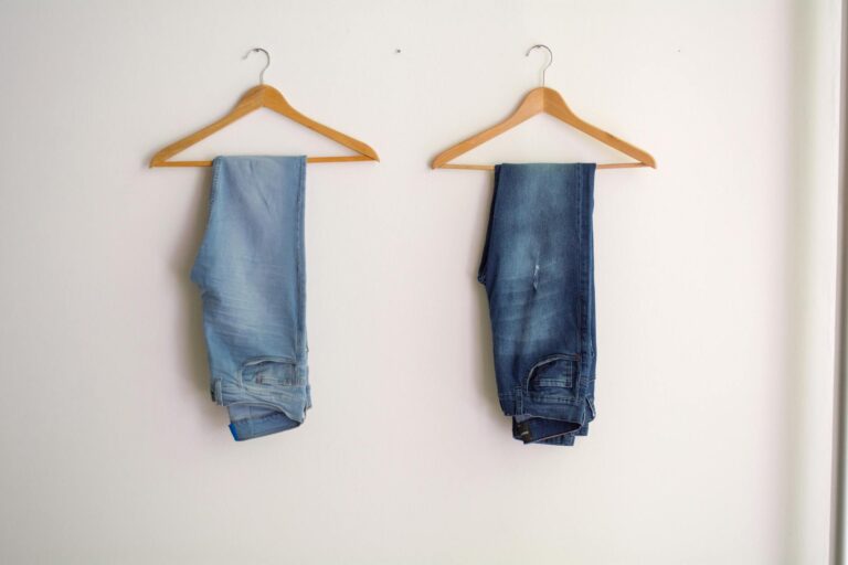 two hanged blue stonewash and blue jeans