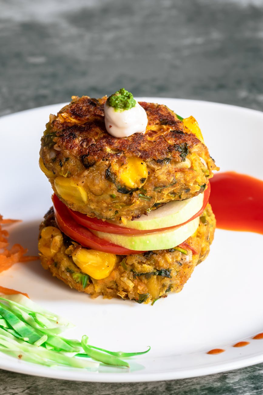 corn fritters on white plate