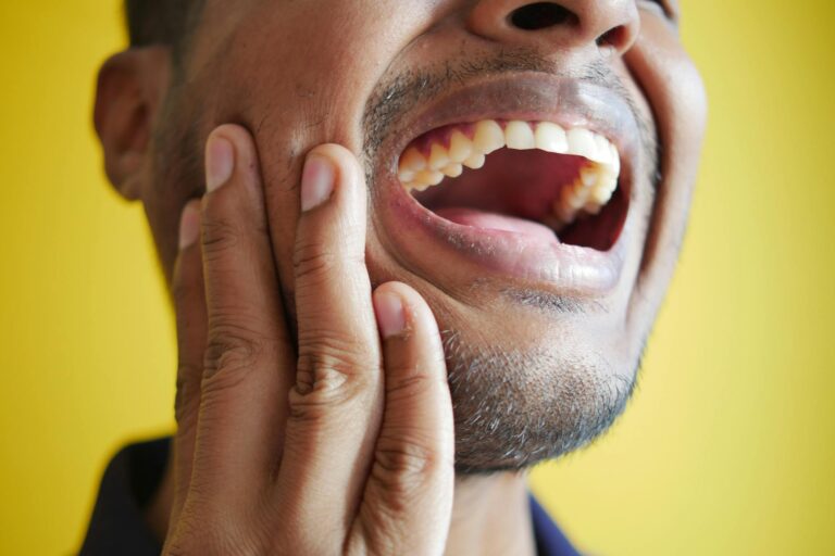 close up of a man laughing