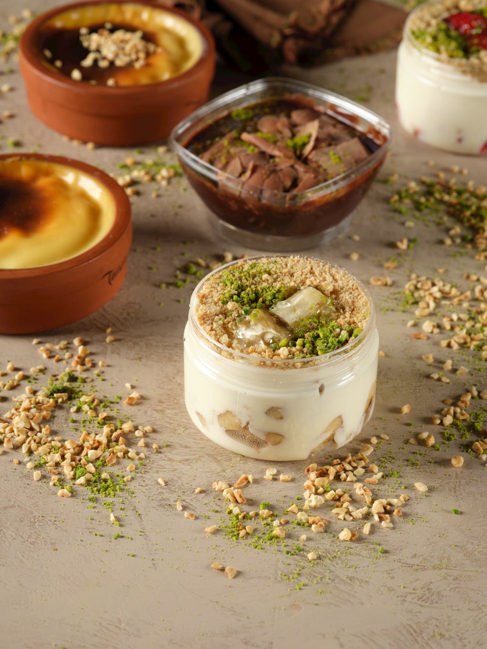 traditional turkish puddings with pistachios sprinkle