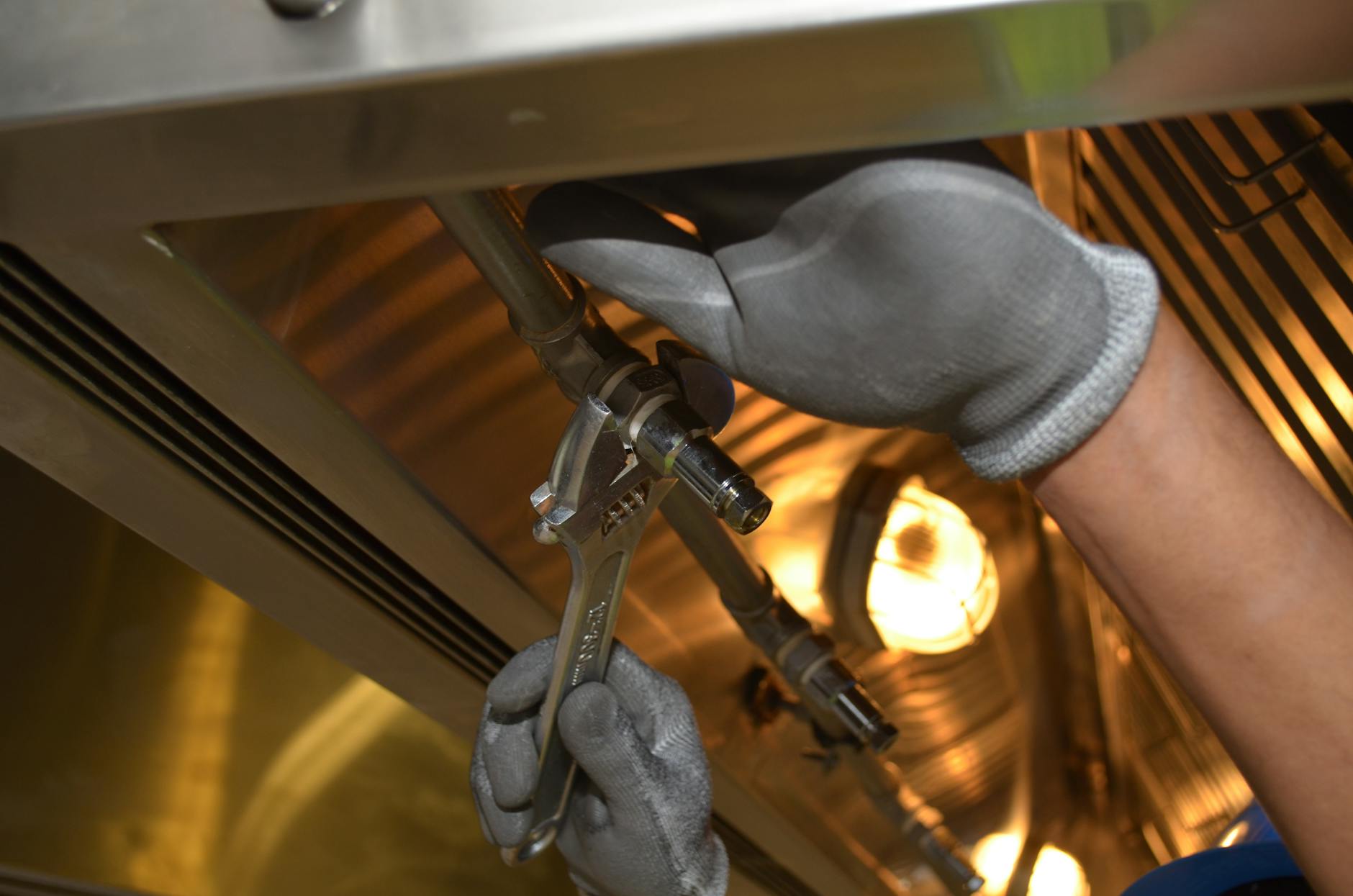 close up of man using a spanner