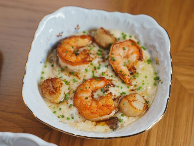 creamy shrimp and scallops in porcelain dish