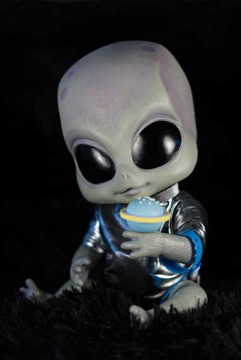 cute alien toy with space theme