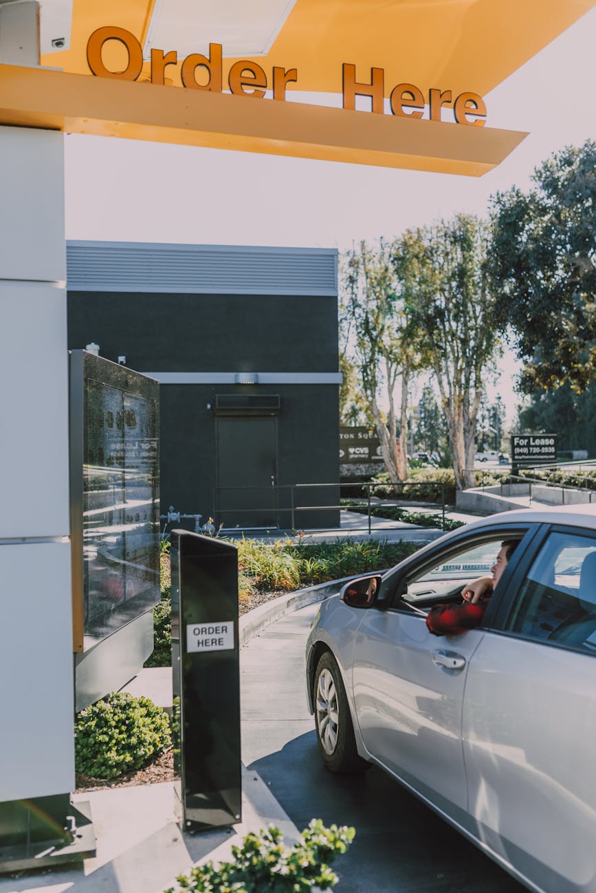 gray car on a drive thru