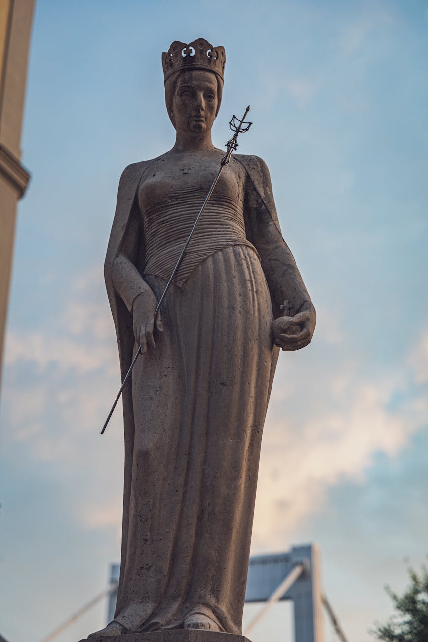 old stone statue of duchess in crown