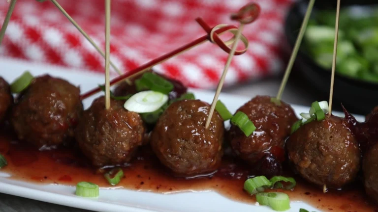 White appetizer plate full meatball