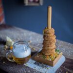 fried dish beside drink