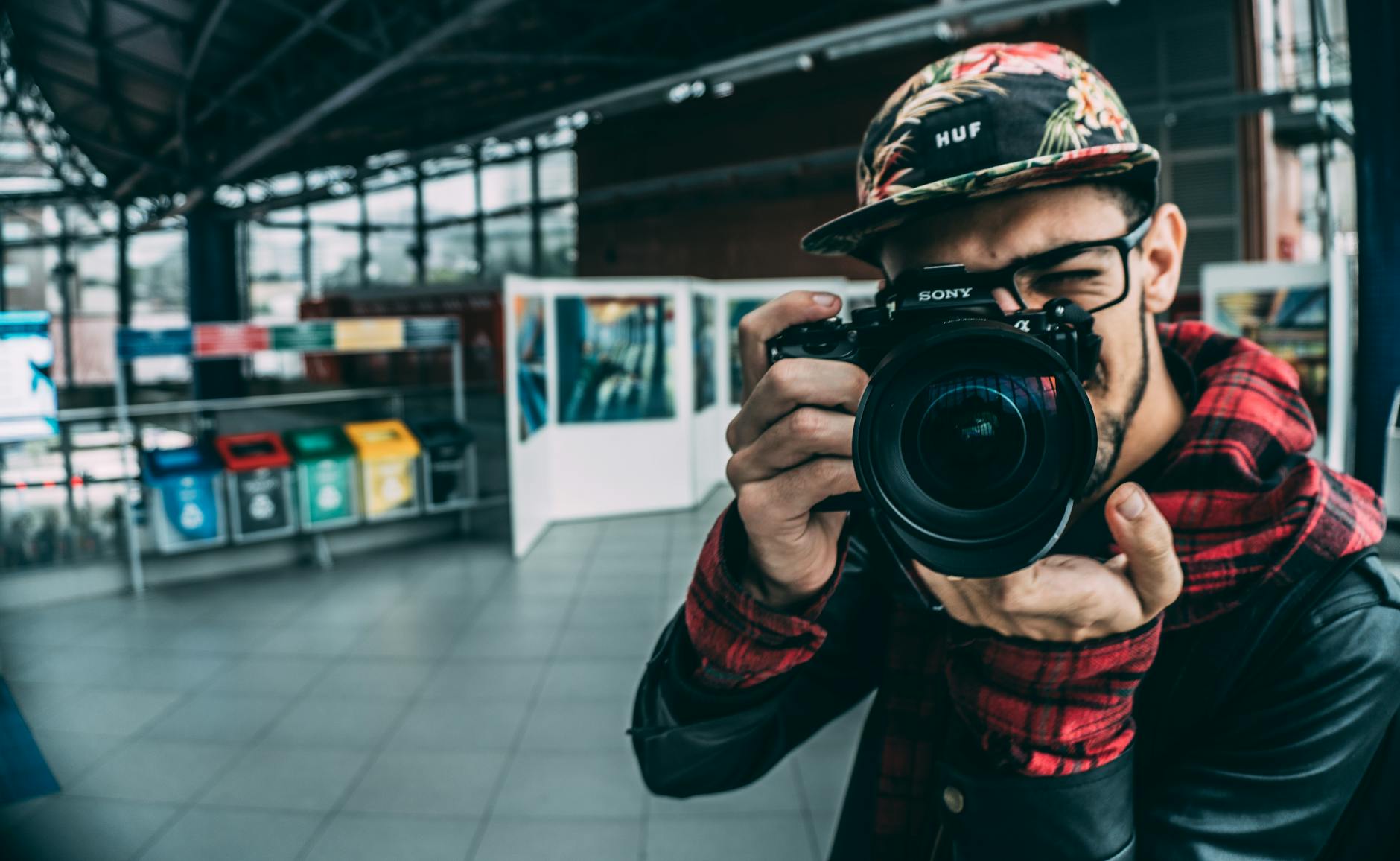 man holding dslr camera