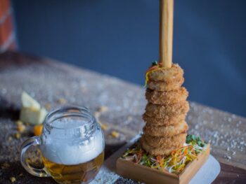 fried dish beside drink