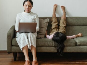 photo of mother working at home