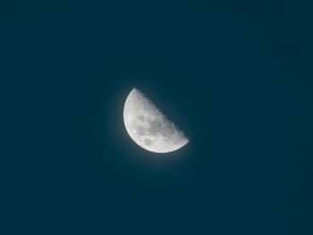 half moon on dark sky