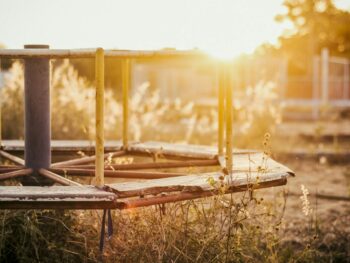 brown metal playground during golden hour