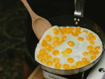 delicious quail eggs frying in pan