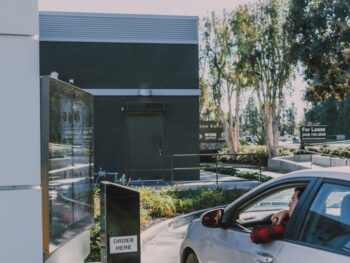 gray car on a drive thru