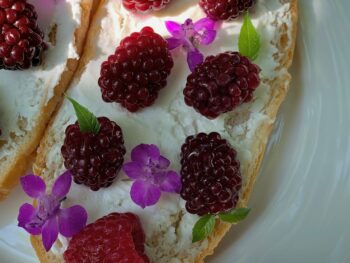 blueberries and raspberries on toasts