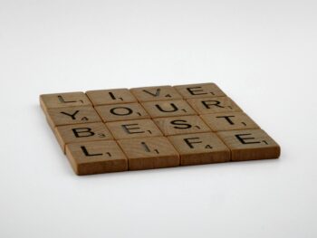 brown wooden scrabble tiles on the table